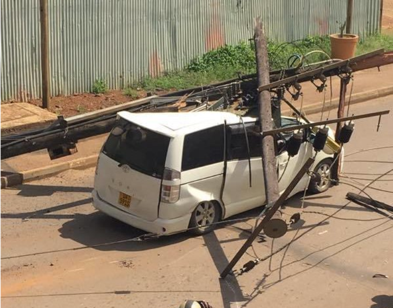 Panic as Woman’s Car is hit by Electricity Transformer in City Centre