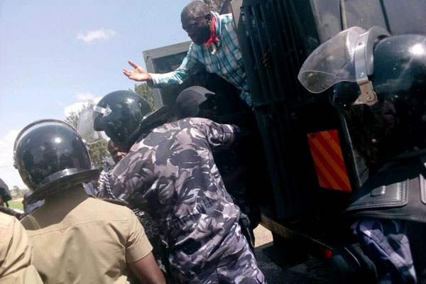 Besigye Re-arrested Shortly after Court Extended His Bail