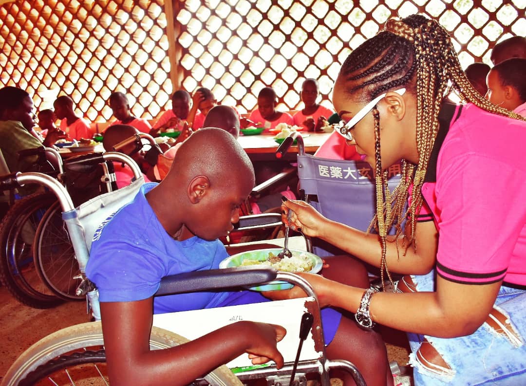 PHOTOS: Singer Zanie Brown Visits Kampala School for the Physically Handicapped