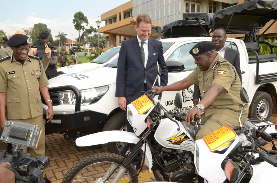 Refugee Law Project Donates Vehicles, Motorcycles to Police