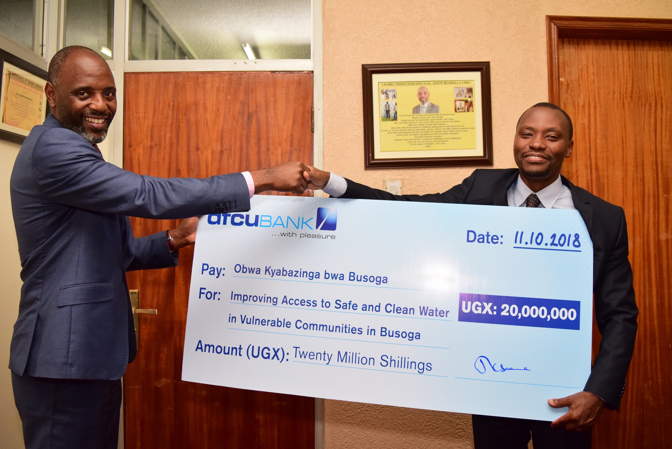 Dfcu Donates Shs 20M Towards Improving Access to Clean Water in Busoga