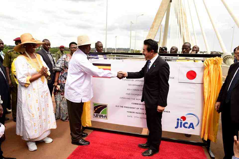 Museveni with minister Sato. Courtesy Photo