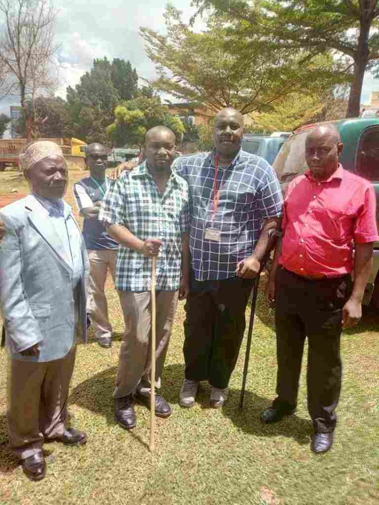 Yusuf Kawooya finally released. In the photo Kawooya is flanked by his father Habib Jjingo and Nakawa MP Michael Kabaziguruka.
