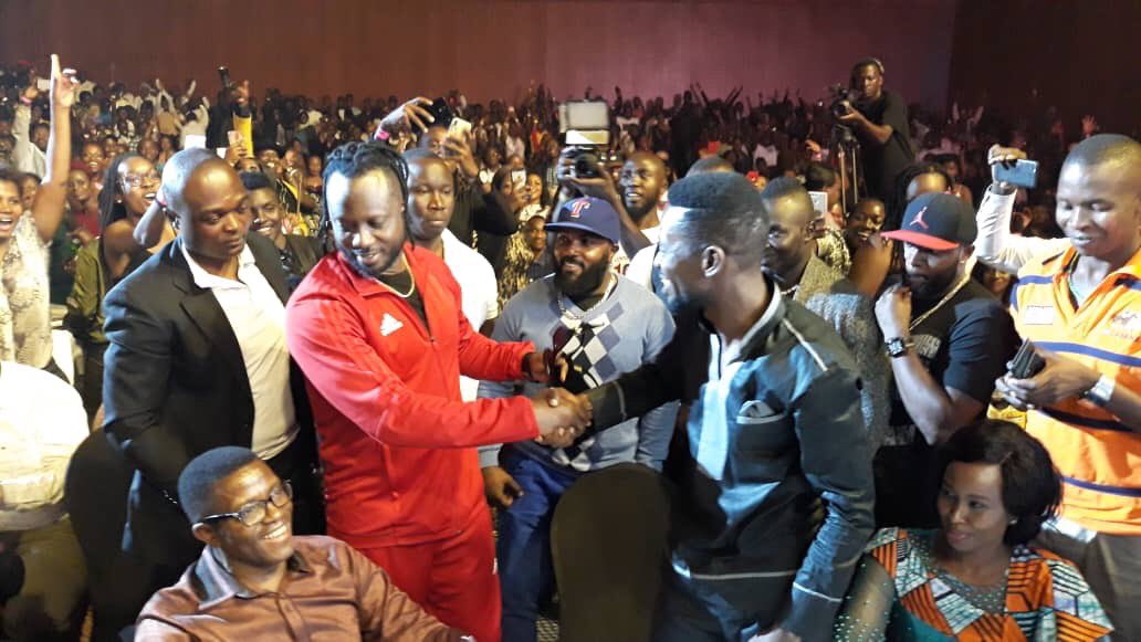 VIDEO: Bobi Wine, Bebe Cool Hug, Share Same Table at Eddy Kenzo Concert