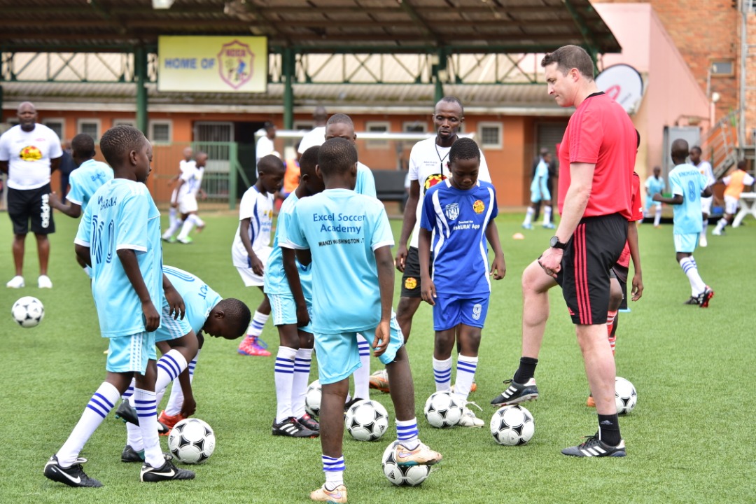 Manchester United Coaches Mike Neary, Chris O’Brien Train Excel Soccer Academy Students