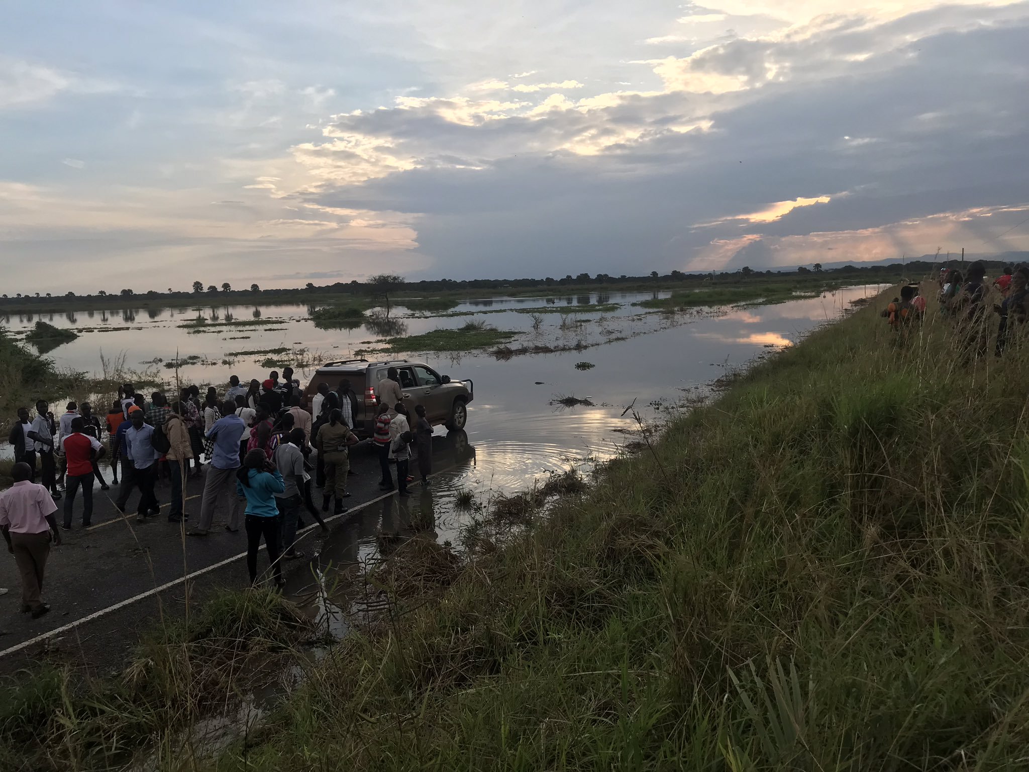 PHOTOS: Travelers Stranded as Floods Cut off Pakwach Bridge