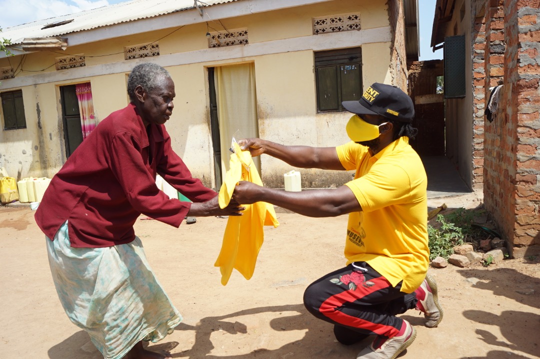 PHOTOS: Singers Bebe Cool, Big Eye Go Door to Door on Hunt for Museveni Votes in Soroti