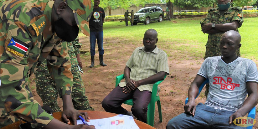 UPDF Hands Over Two NAS Rebels to South Sudan Government