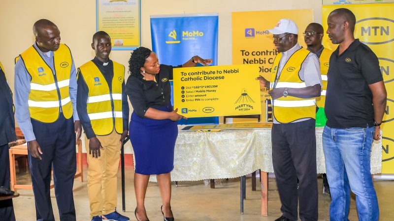MTN Uganda Empowers Nebbi Diocese with Ugx 20,000,000 Martyrs’ Day Contribution, Launches Fundraising Code
