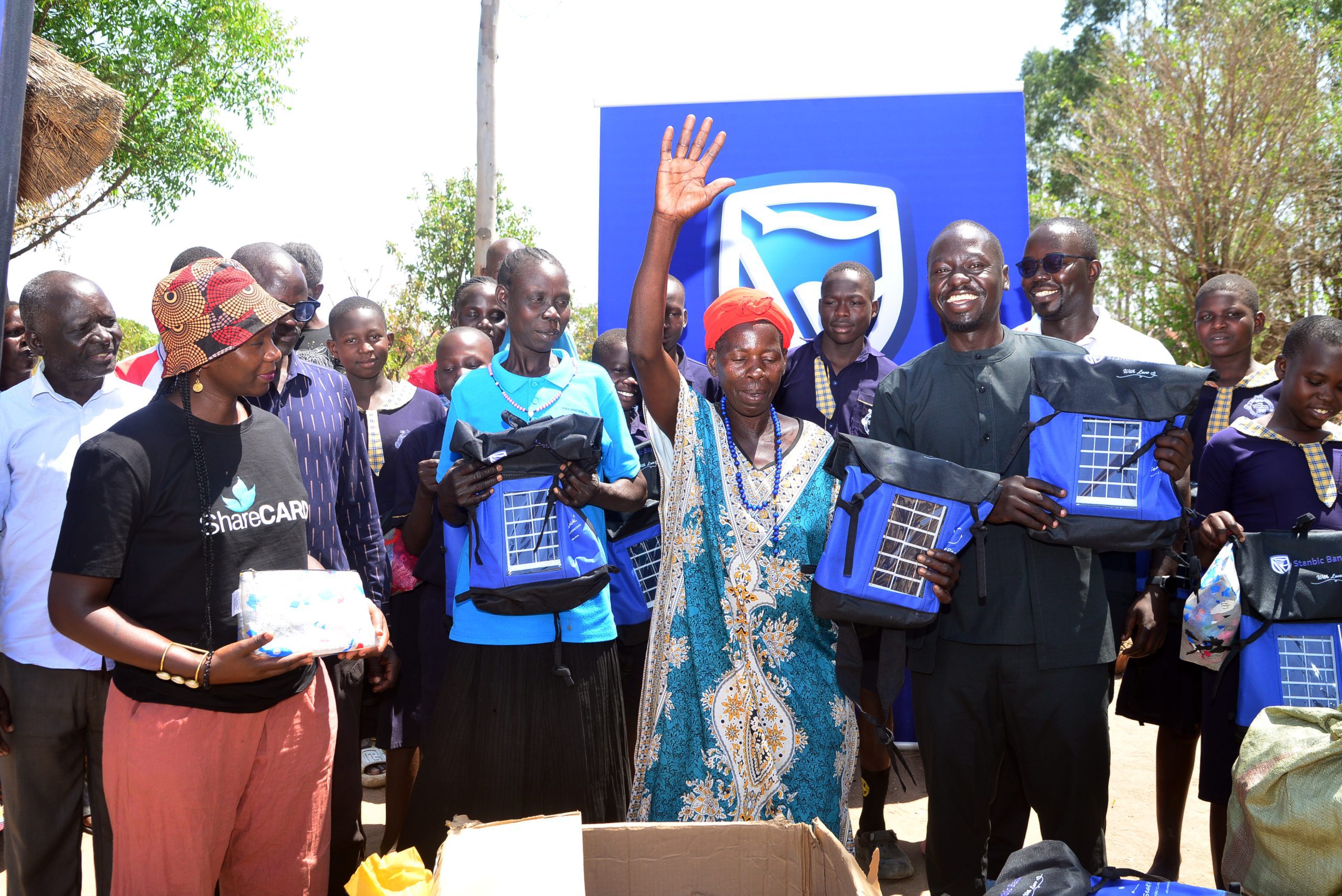 Stanbic Bank Lights up Okere City School Girls with 220 Solar powered Bags