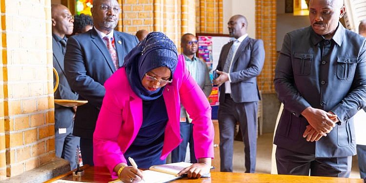 KCCA Director Buzeki Pay Their Condolences To Catholic Community