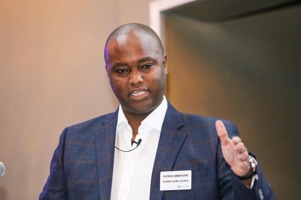 Standard Bank Group Reassigns Ugandan Executives Patrick Mweheire, Francis Karuhanga