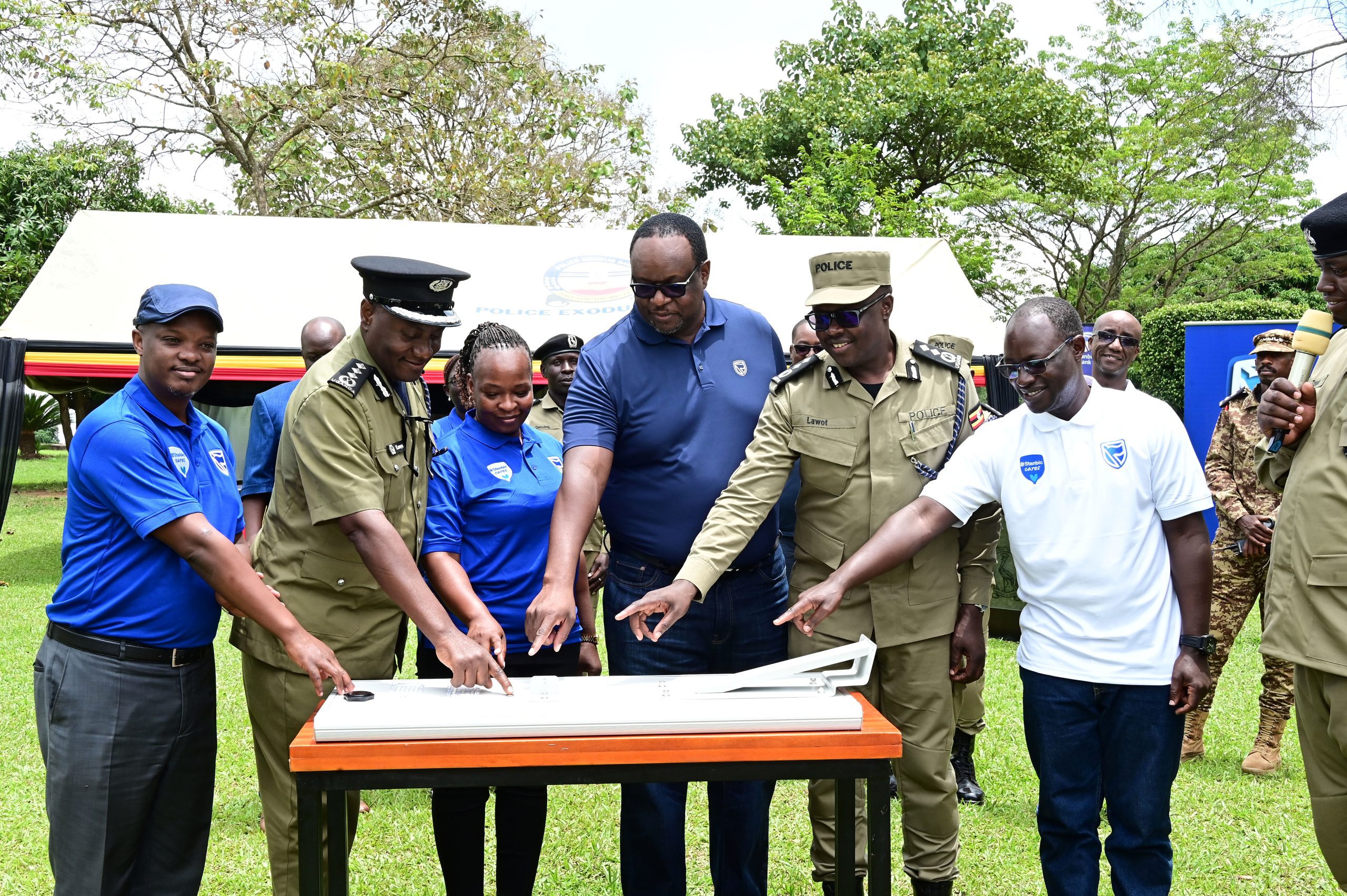 Stanbic Bank Lights Up Kabalye Police Training Facility with UGX100m Solar Equipment
