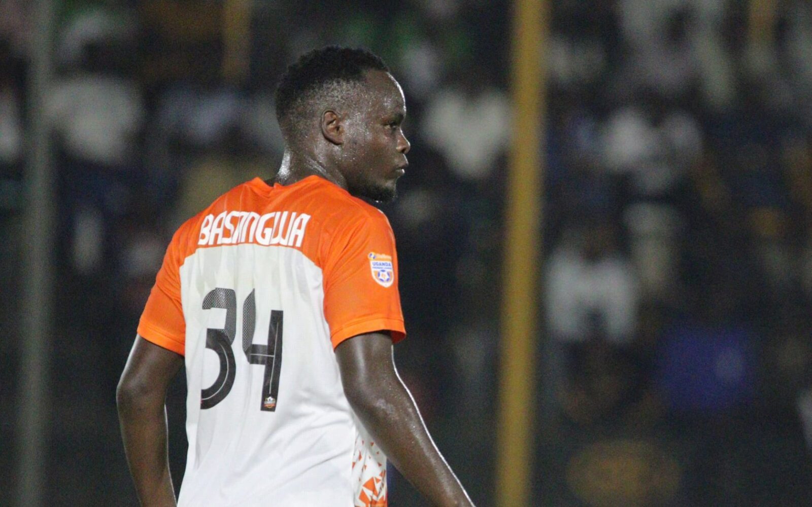 NEC FC Forward Richard Basangwa in Stable Condition After Throat Injury in Match Against Express FC